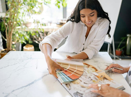 woman-holding-palette-of-colors