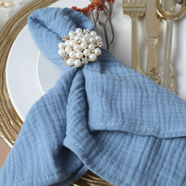 https://www.cvlinens.com/cdn/shop/files/cotton-gauze-crinkle-napkins-dusty-blue1_grande.jpg?v=1685898899